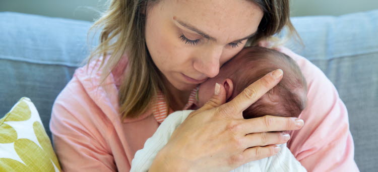 Mamma med spädbarn